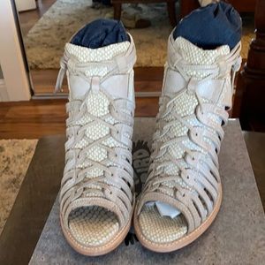 Brand new with box.  Grey bootie/sandal with zippered back; Size 9.